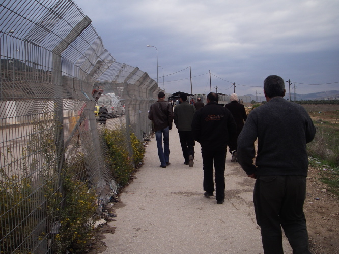 Palestinians arriving at Huwwara checkpoint outside Nablus